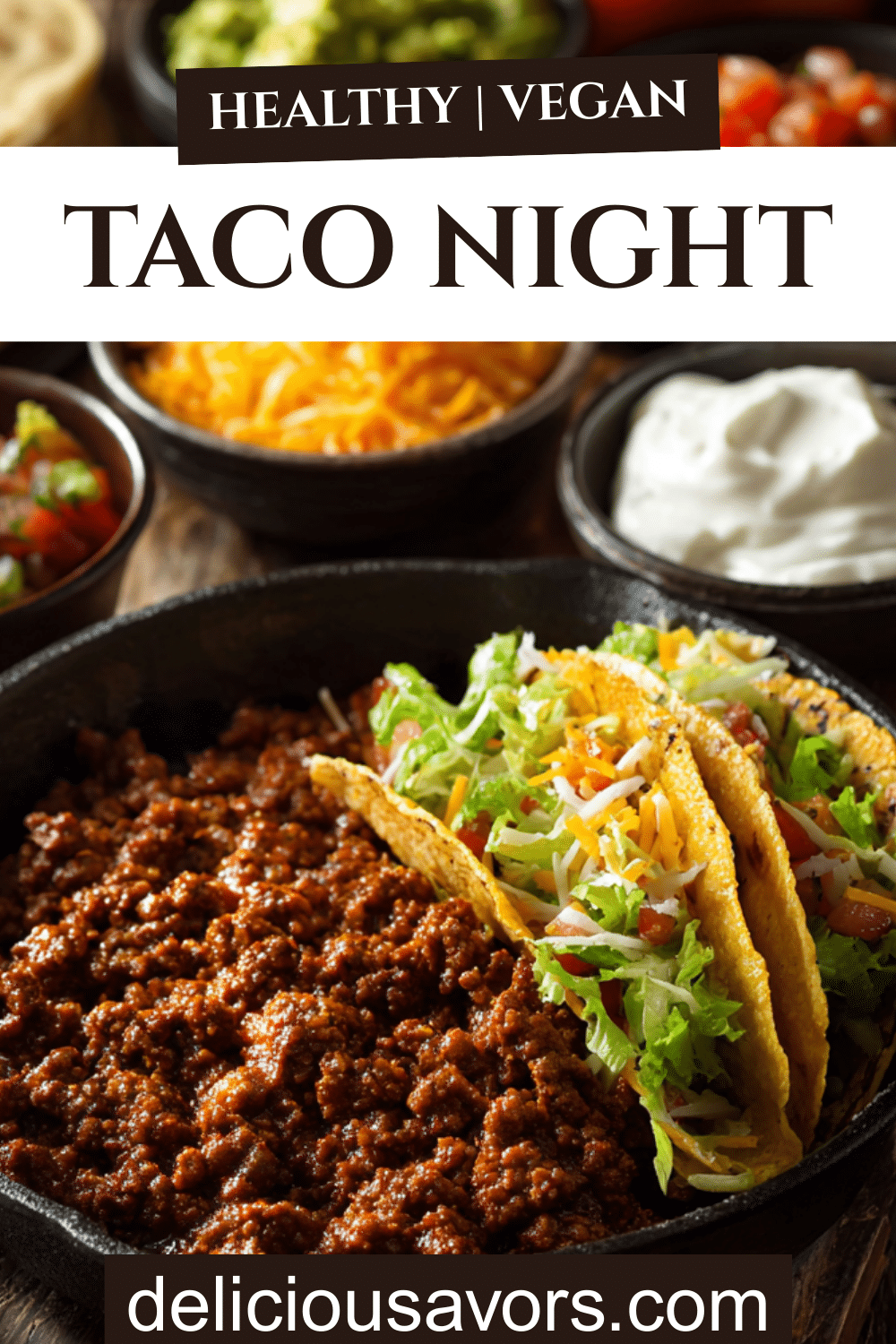 A colorful taco night spread with seasoned ground beef, hard and soft tortillas, shredded cheese, lettuce, salsa, sour cream, and avocado served on a rustic table.