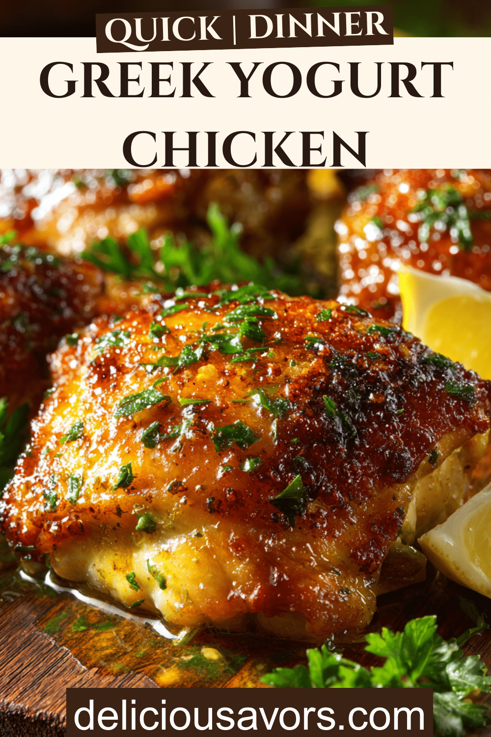 Golden-brown Greek yogurt chicken thighs with crispy edges in white baking dish, garnished with fresh parsley and Mediterranean spices