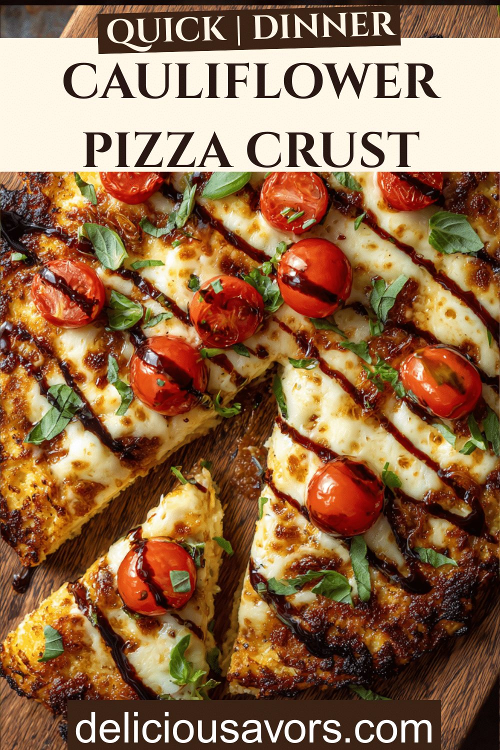 Golden crispy cauliflower pizza crust topped with melted mozzarella cheese, fresh cherry tomatoes, basil leaves and balsamic glaze on wooden cutting board