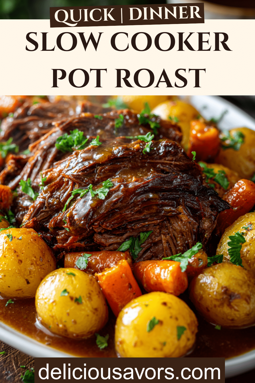 Tender slow cooker pot roast with shredded beef, golden Yukon potatoes, and orange carrots on white platter with rich brown gravy and fresh parsley garnish