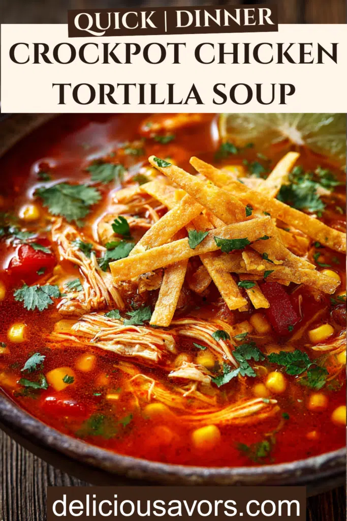 Steaming bowl of crockpot chicken tortilla soup topped with melted cheese and crispy tortilla strips on wooden table