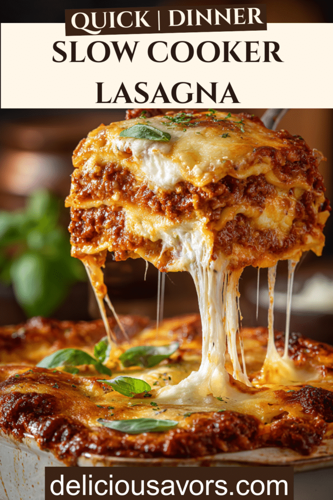 Overhead view of bubbling slow cooker lasagna with melted cheese and visible pasta layers in ceramic insert