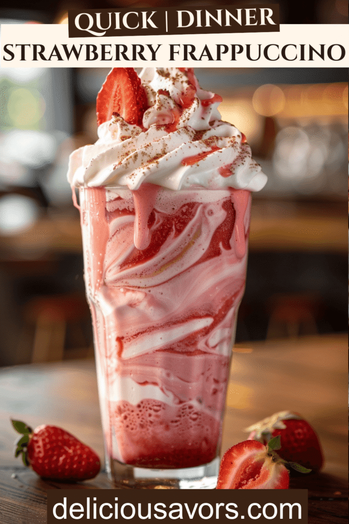 Creamy homemade Strawberry Frappuccino in tall glass with whipped cream and strawberry garnish, perfect iced pink coffee drink copycat Starbucks recipe for summer refreshment.